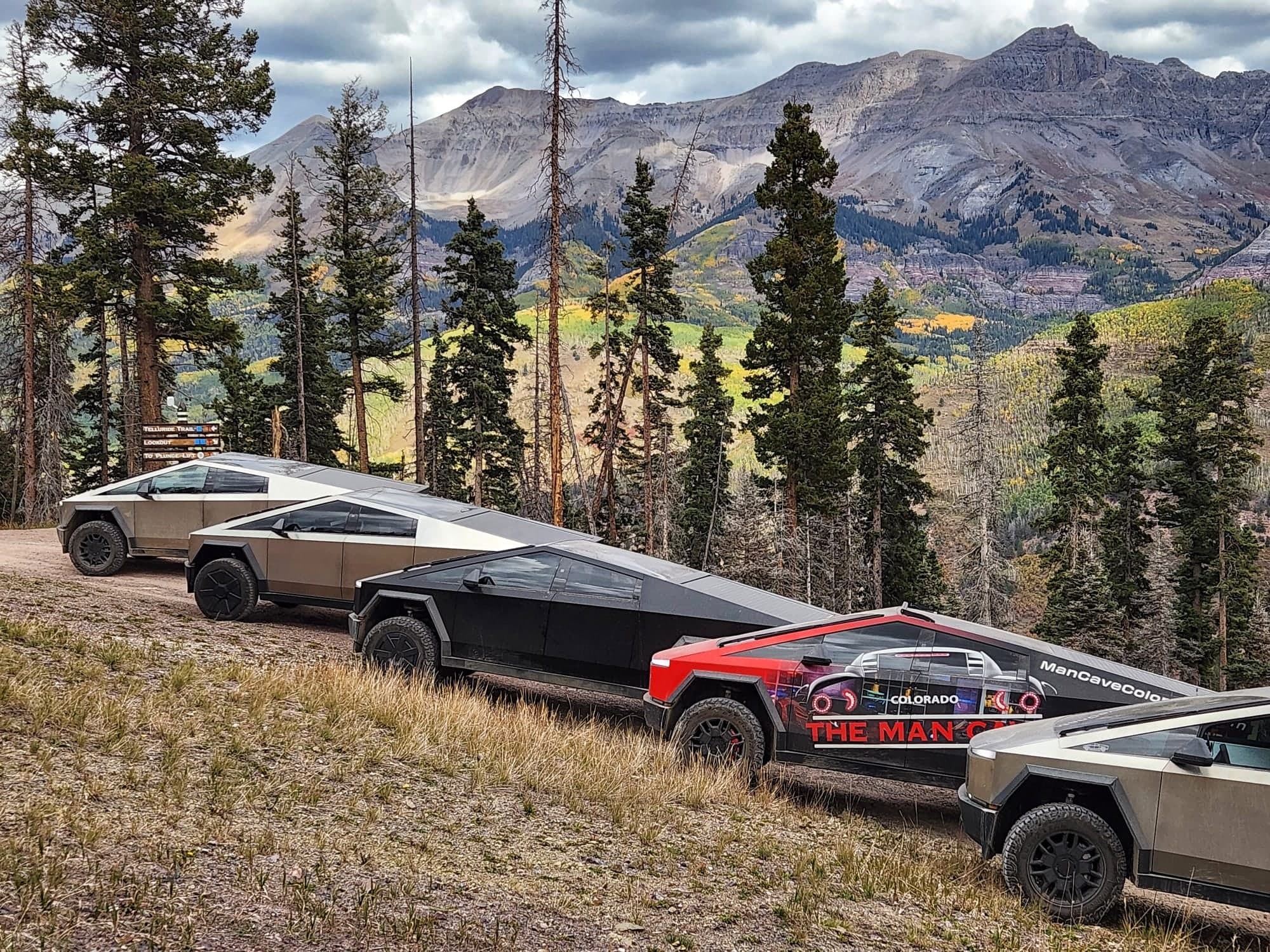 Cybertruck lineup at a Colorado mountain overlook